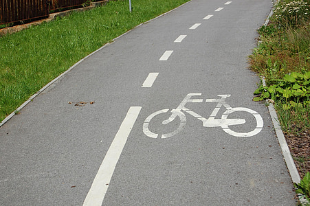 gray concrete road at daytime thumbnail