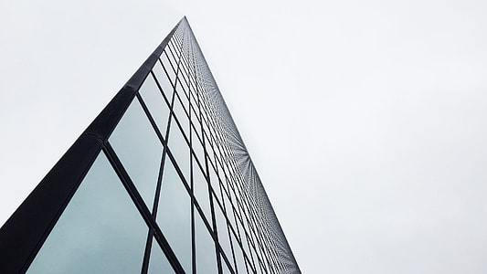 low-angle photography of gray and black building thumbnail