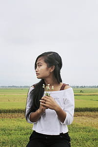 Photo of Girl in White Off-shoulder Top thumbnail