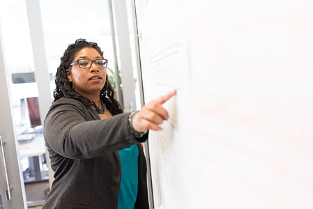 Woman Beside Whiteboard thumbnail