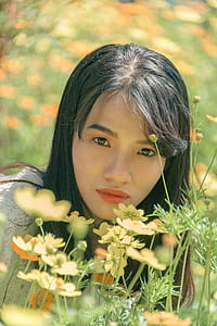 Woman Near Yellow Flowers thumbnail