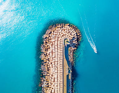 aerial photography of island during daytime thumbnail