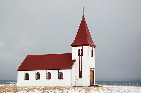 red and white house near beach during daytime thumbnail