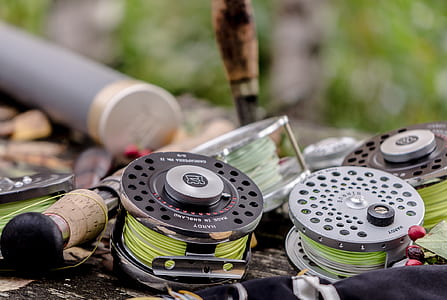 four gray and black reels selective focus photography thumbnail