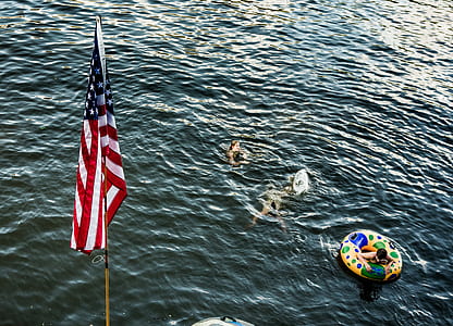 boy on life ring dipped into body of water thumbnail