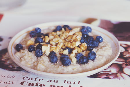 rice with blueberries in round white ceramic saucer thumbnail