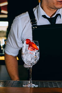 sliced strawberries on clear wine glass thumbnail