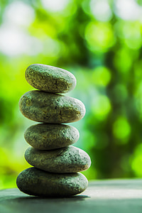selective focus photography of balance stone thumbnail