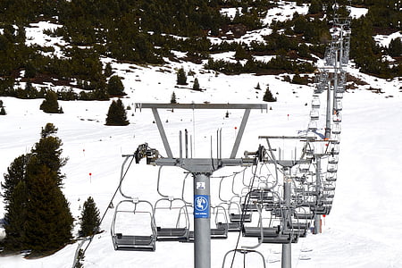 silver utility tower on snowfield thumbnail