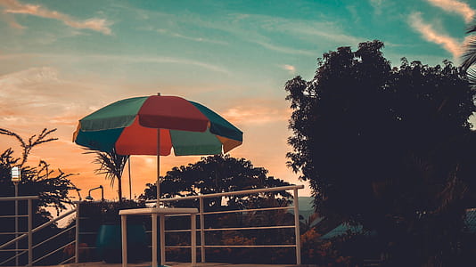 Red, Blue and Green Patio Umbrella thumbnail