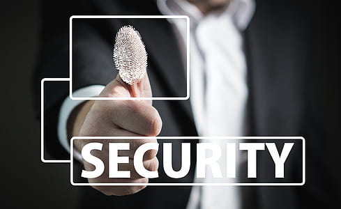 man wearing black suit jacket doing finger print thumbnail
