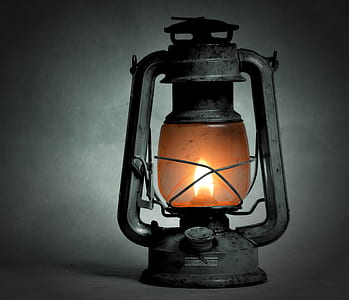 selective photography of kerosene lantern thumbnail