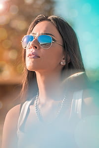 woman wearing white tank top thumbnail