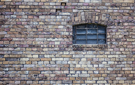 black 16-pane window with concrete frame photo thumbnail