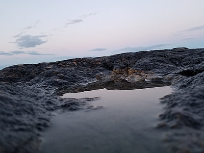 gray mountain with body of water thumbnail