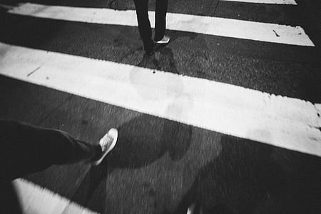 two people crossing on pedestrian lane thumbnail