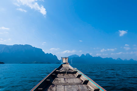 boat on body of water at daytime thumbnail
