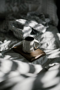 white ceramic mug on brown wooden board thumbnail
