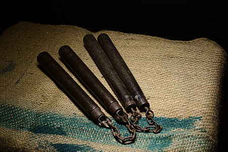 two black handled nunchucks thumbnail