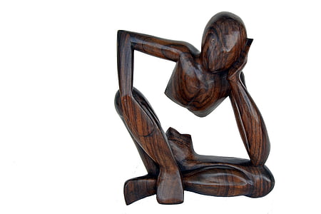 brown wooden human figure sculpture thumbnail