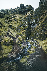 green covered mountain during daytime thumbnail