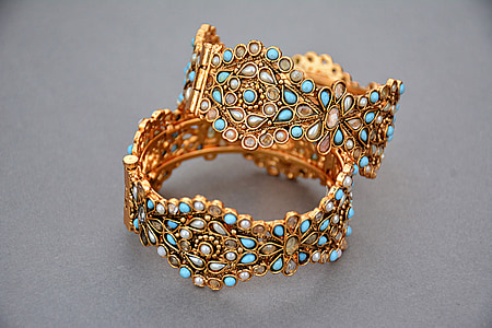 two gold-colored bangles thumbnail