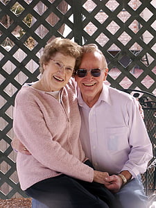 man wearing white dress shirt carrying woman thumbnail