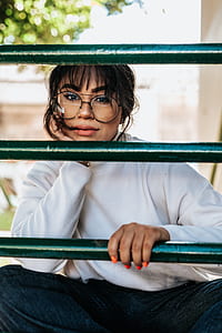 woman sitting with right hand on chin thumbnail