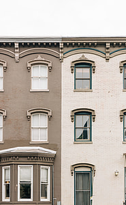 photography of brown and beige concrete buildings thumbnail