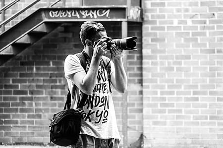 man taking photo thumbnail