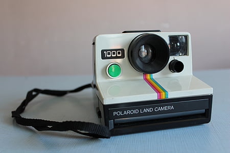 white and black Polaroid land camera thumbnail