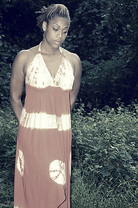 woman standing near grass thumbnail