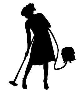 Silhouette of woman cleaning with vacuum. thumbnail