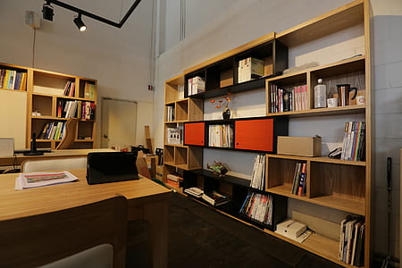 brown wooden bookshelves thumbnail