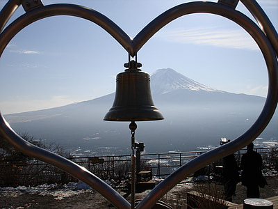 heart-shaped framed bell facing mountain thumbnail