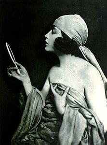 woman holding hand mirror painting thumbnail
