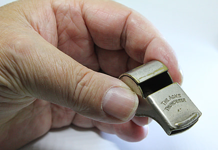 person holding whistle thumbnail