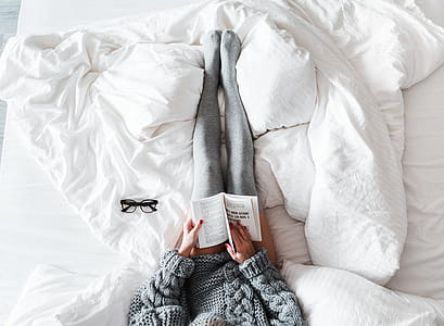Woman Reading a Book in Bed thumbnail