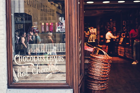 brown wicker basket near display case thumbnail