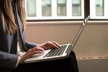Woman Using Macbook Pro thumbnail