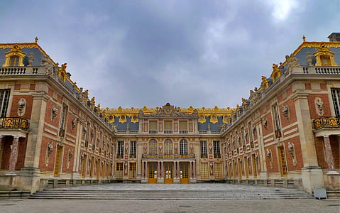 photo of brown and blue building thumbnail