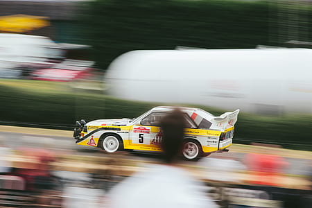 time-lapsed photography of yellow and white car thumbnail