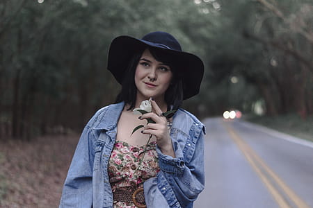 Woman Standing Near Asphalt Road thumbnail