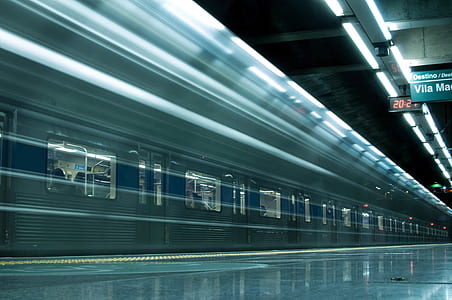 Time Lapse Photography Of Train In Train Station thumbnail