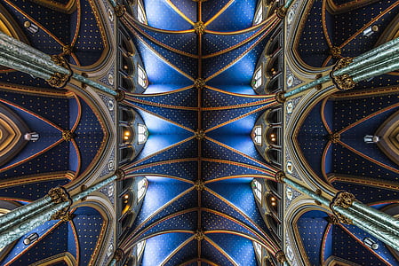 low-angle photography of blue and gray building interior thumbnail