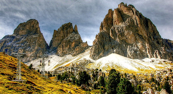 tall green trees near mountains during daytime thumbnail