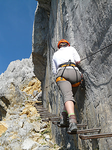 woman climbing mountain thumbnail