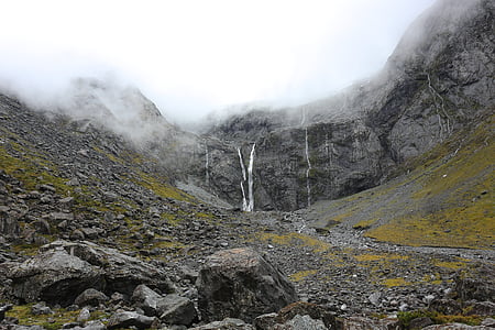 gray foggy mountain during daytime thumbnail