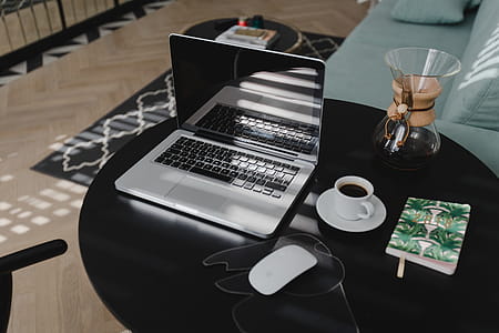 Workplace with laptop on table at home thumbnail