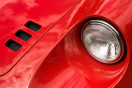 red car with gray headlight thumbnail